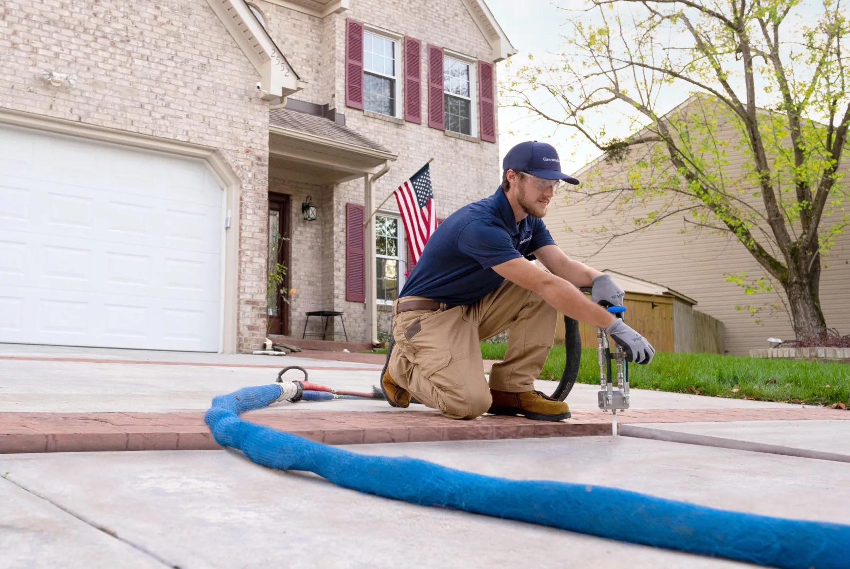 Foam concrete leveling of a sunken slab